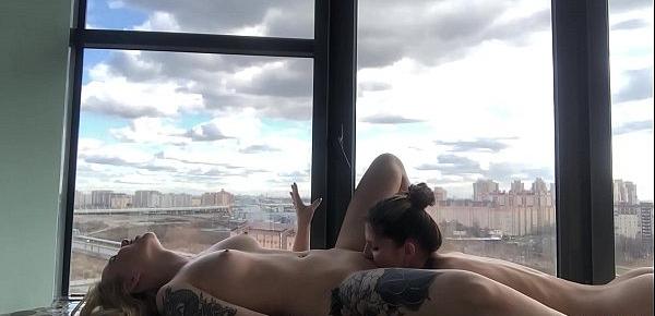  Beautiful lesbian sex on a balcony